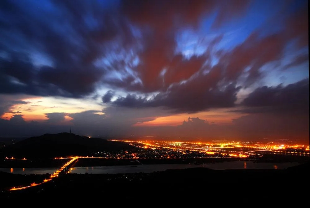 华为手机里的“丝绢流水”拍照功能如何用？